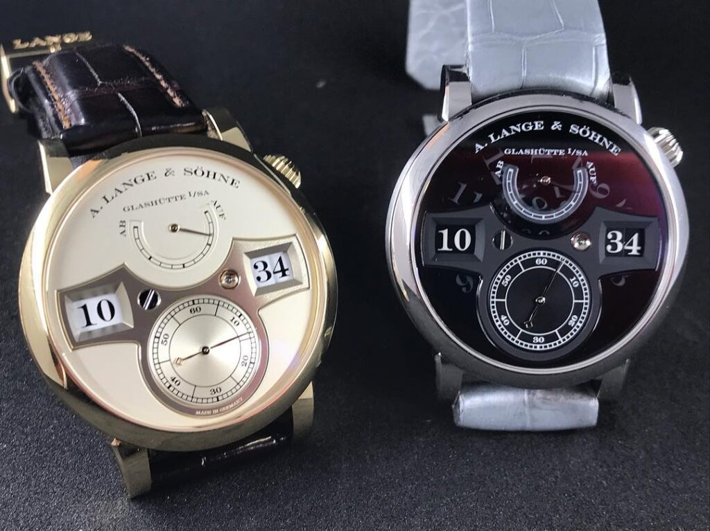 A Lange SOhne Zeitwerk Lumen Phantom platinum special edition black dial 140.035 and yellow gold 140.021 side by side