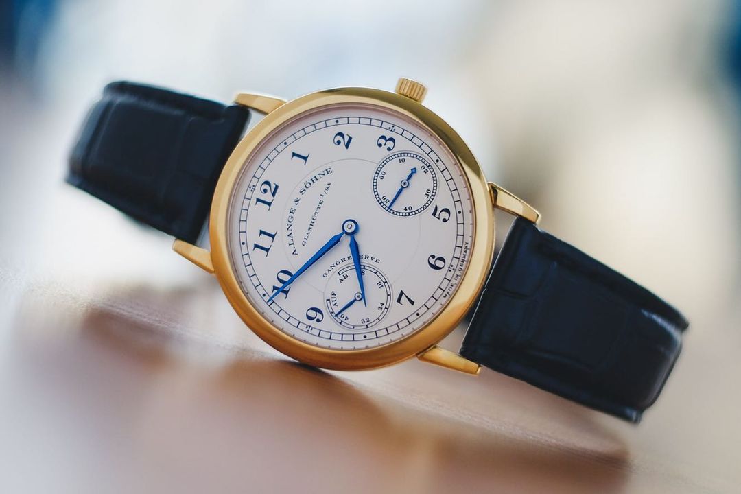 a lange söhne 1815 updown yellow gold silver dial blue hands 36mm case 221.021 rare